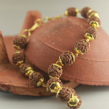 Rudraksha Bracelet with solid Gold caps