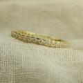 handmade jewelry, prong-set ring, natural diamonds, recycled gold, eternity band, sustainable jewelry, 
