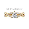 Close-up of trillion cut lab diamond ring with halo and studded shank in recycled gold, Elegant side view of handmade lab-grown diamond ring in yellow gold with detailed shank,
