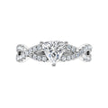 On-hand display of elegant trillion-cut lab-grown diamond ring in 18K recycled gold.

Stacked look showcasing the trillion-cut lab diamond ring paired with matching bands.