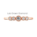 Rose gold stacking diamond ring with lab-grown diamonds on a white background
