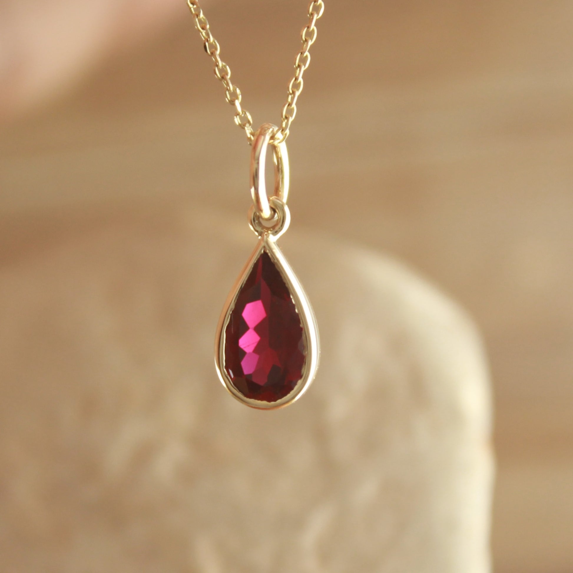 Classic Ruby Necklace with Pear Shape Stone – Everyday Jewelry,
Minimalist July Birthstone Necklace – Pear Ruby Gold Pendant,
Pear Cut Red Ruby Gold Necklace – Lab Created Gemstone Jewelry,
Delicate Lab Ruby Necklace – Pear Shape Pendant in Gold,