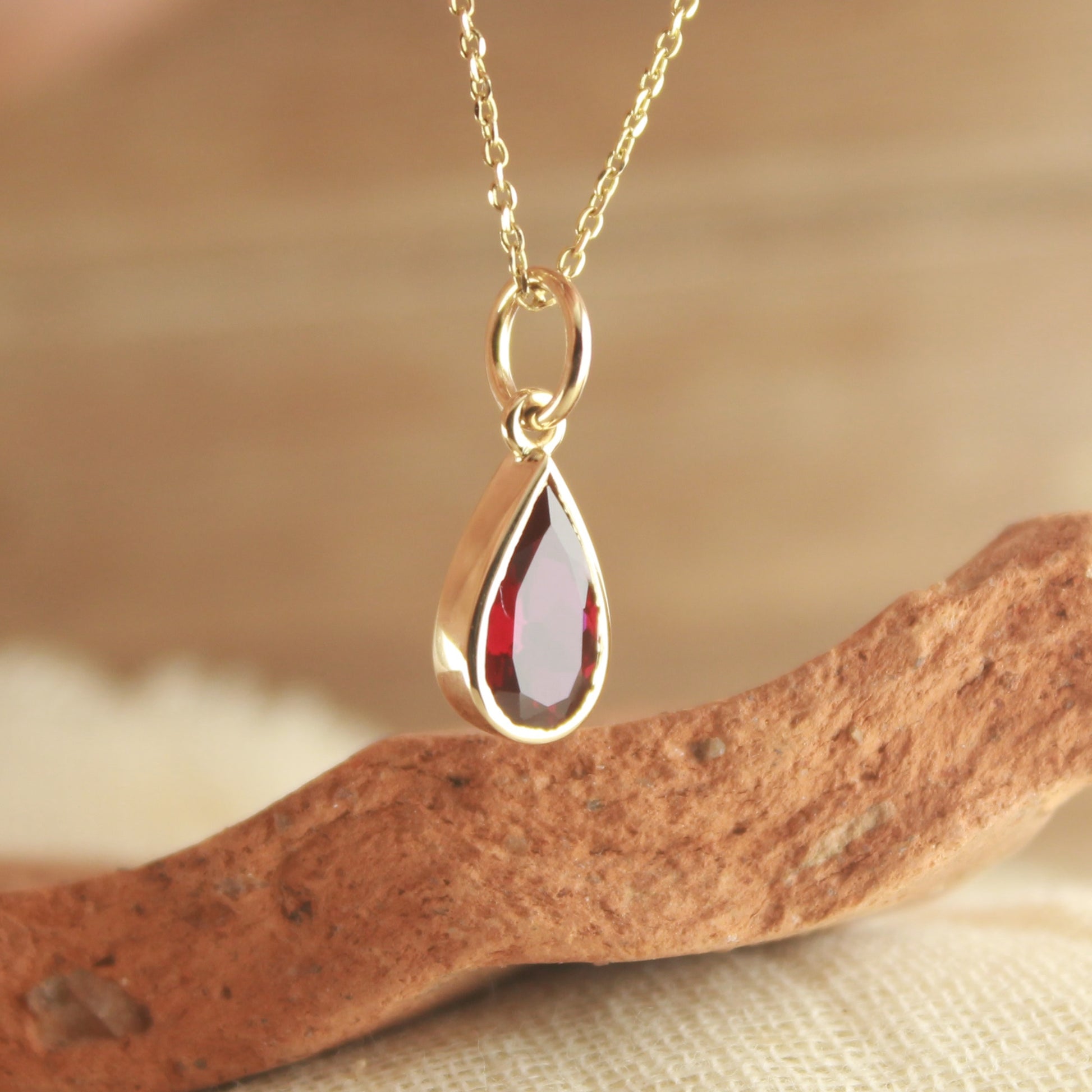 Handmade Gold Pendant with Pear Cut Lab Ruby – Elegant Design,
Pear Shape Ruby Charm Necklace – Delicate Gold Pendant for Her,
Elegant Gold Necklace with Pear Cut Ruby – Lab Created Jewelry,