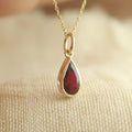 Pear Cut Lab Ruby Pendant in Gold – Minimalist Everyday Necklace,
Dainty Pear Shaped Ruby Pendant in Bezel Setting – Gold Necklace,
Minimalist Ruby Gold Pendant Necklace – Pear Cut Lab Gemstone,